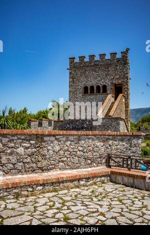 The Tower. Beautiful warm spring day and archeological ruins at Butrint National Park, Albania, UNESCO heritage. Travel photography with fresh green flora and clear blue sky Stock Photo