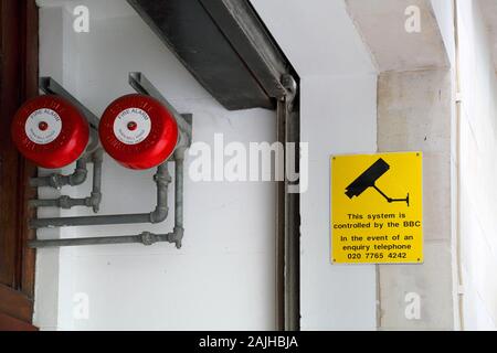 cctv camera warning sign at broadcasting house london Stock Photo