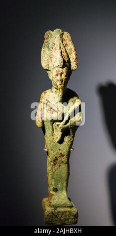 Photo taken during the opening visit of the exhibition “Osiris, Egypt's Sunken Mysteries”. Statuette of the god Osiris. Stock Photo
