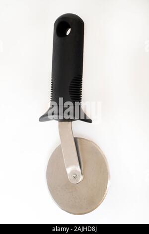 Pizza slicer cutter kitchen tool wheel Stock Photo