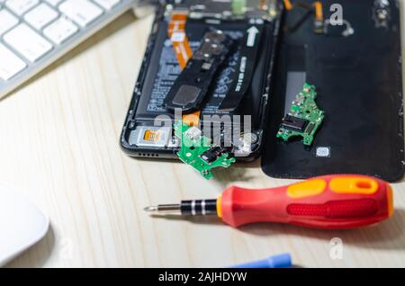 Change the mobile phone electronics circuit board Stock Photo