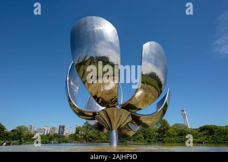 Floralis Genérica is a sculpture made of steel and aluminum located in Buenos Aires.  It weighs eighteen tons and is 23 meters high. Stock Photo