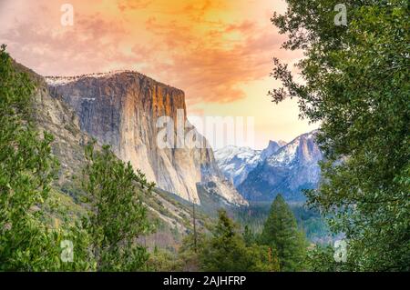 Yosemite National Park overlook at sunset. Panorama of El Captain, Half Dome and Horsetail Waterfall. California, United States. Stock Photo