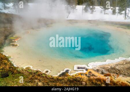 View of the Norris Geyser Basin with a Geothermal blue pool, Yellowstone National Park, USA.