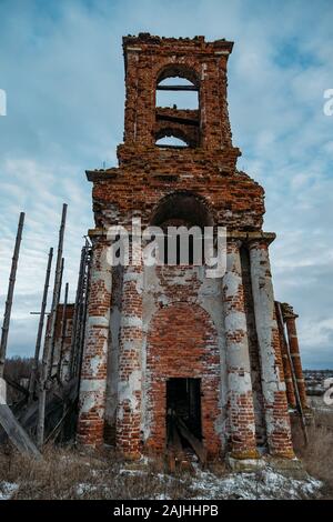 Ruined bell tower of abandoned church of St. Nicholas the Wonderworker in Upper Studenets, Lipetsk region, Russia. Stock Photo