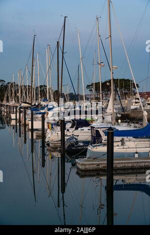 San Francisco, California / USA - Feb 7th 2019 - yachts in a marina in front of Golden Gate Bridge on February morning Stock Photo