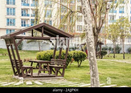 summer wooden gazebo for rest and picnic in one of the parks of Istanbul Stock Photo