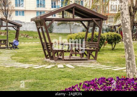 summer wooden gazebo for rest and picnic in one of the parks of Istanbul Stock Photo