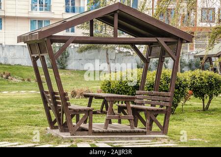 summer wooden gazebo for rest and picnic in one of the parks of Istanbul Stock Photo