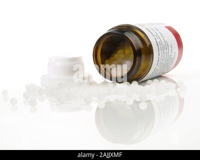 Homeopathy Pills on white Background Stock Photo