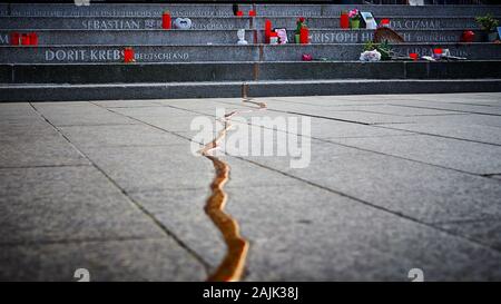 Memorial to the victims of the truck terrorist who drove his truck into Christmas Market in Berlin Germany in 2016. Gold line on sidewalk and names. Stock Photo
