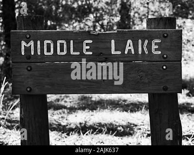 Conroe, TX USA - 11/15/2019  -  Middle Lake Wooden Sign B&W Stock Photo