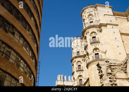 Contrast of old and new buildings in Malaga, Spain Stock Photo