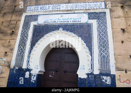 The entrance of the Lycée Moulay Idriss situated on Place Boujloud (also known as Place Bou Jeloud or Place Pacha el-Baghdadi) in Fes (Fez), Morocco Stock Photo
