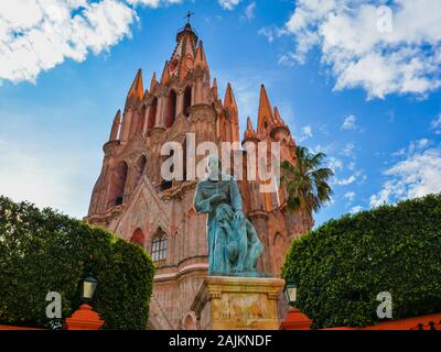 Statue of Father Juan de San Miguel in front of Church of Saint Michael The Archangel - San Miguel de Allende, Mexico Stock Photo