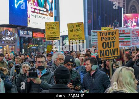 New York, NY – January 04, 2020: Hundreds of people gathered in Times Square in New York City to protest war against Iran & Iraq on January 4th 2020.