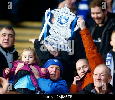 WATFORD, ENGLAND - JANUARY 04:   Tranmere Rovers Fan holding FA Cup during Emirates FA Cup Third Round match between Watford and Tranmere Rovers on Ja