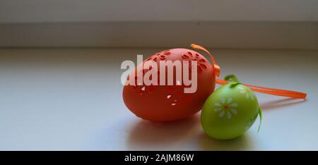 happy easter: decorative easter eggs on a white platform Stock Photo