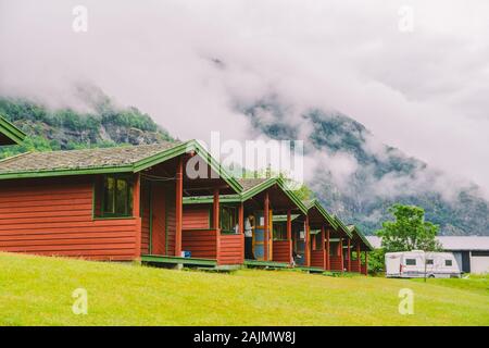 Traditional red camping houses in Lunde Camping, Norway July 21, 2019. Classical Norwegian Camping site with traditional wooden red cottages, Northern Stock Photo