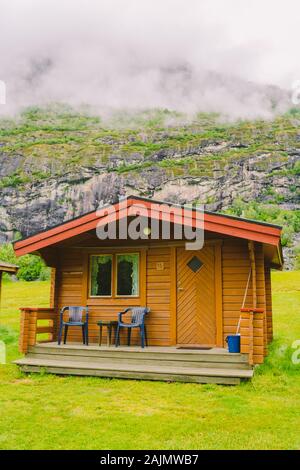 Traditional red camping houses in Lunde Camping, Norway. Classical Norwegian Camping site with traditional wooden red cottages, Northern Norway Stock Photo