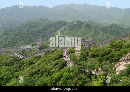 Badaling a strategic pass through a gorge in the Jundu Mountains, is the easiest major section of Great Wall to get to from Beijing, and the busiest b Stock Photo