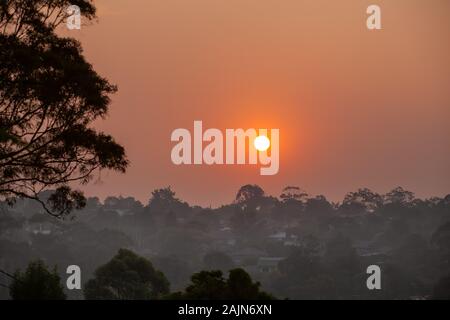 Smoke with sunlight from a bushfire in Australia Stock Photo - Alamy