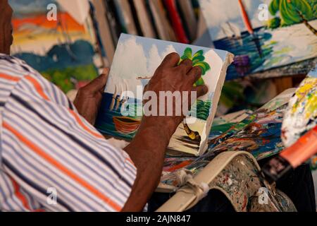 Dominican painter paints 2 Stock Photo