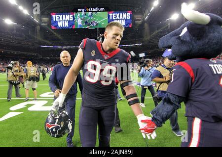 January 4, 2020: Houston Texans fans wave flags during the 1st quarter of  an NFL football playoff game between the Buffalo Bills and the Houston  Texans at NRG Stadium in Houston, TX.