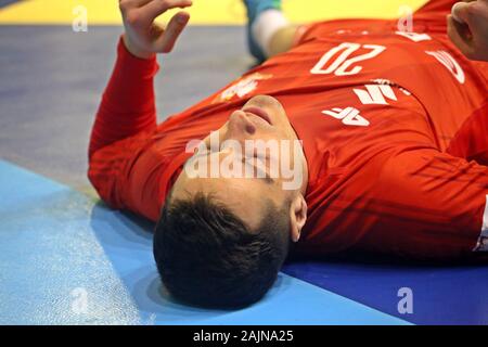 Torrelavega, Spain. 04th Jan, 2020. Torrelavega, SPAIN: Polish player Maciej Pilitowski (20) on the ground during the second day of the XLV International Tournament of Spain 2020 between Spain and Poland with a Spanish victory 35-31 at the Vicente Trueba Pavilion in Torrelavega, Spain on January 4 of 2020. (Photo by Alberto Brevers/Pacific Press) Credit: Pacific Press Agency/Alamy Live News Stock Photo