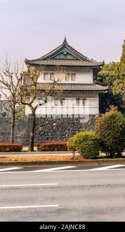 Guard tower over moat by Kikyomon Gate at Tokyo Imperial Palace Japan Stock Photo
