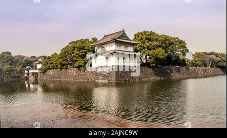 Guard tower over moat by Kikyomon Gate at Tokyo Imperial Palace Japan Stock Photo