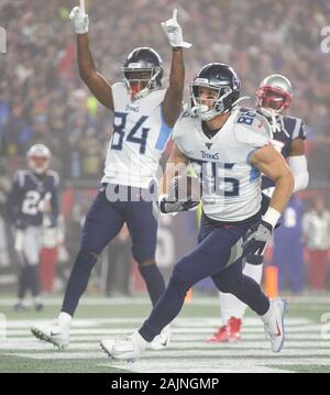 Foxborough, USA. 05th Jan, 2020. Tennessee Titans tight end Anthony Firkser (86) runs through the end zone after scoring on a 12-yard touchdown reception in the first quarter as Nate Washington (84) signals TD against the New England Patriots in the NFL Wild Card game at Gillette Stadium in Foxborough, Massachusetts on Saturday, January 4, 2020. The Titans defeated the Patriots 20-13. Photo by Matthew Healey/UPI Credit: UPI/Alamy Live News Stock Photo