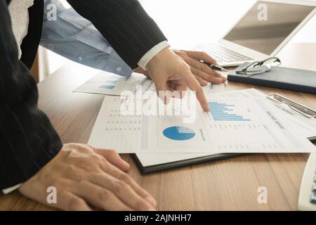 Executives are discussing the financial results of the Company for the marketing plan. Stock Photo