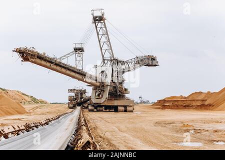 Giant bucket wheel excavator. The biggest excavator in the world. The largest land vehicle. Excavator in the mines. Stock Photo