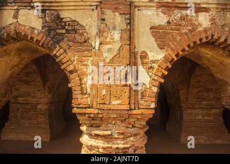 Ancient carvings of dancing girls on the brick walls of the Rasmancha, an old Hindu temple built by the Malla kings in Bishnupur in the 17th century. Stock Photo