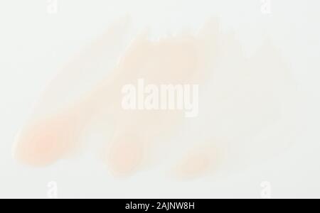 Clear brown paint stain isolated on white background close up view Stock Photo
