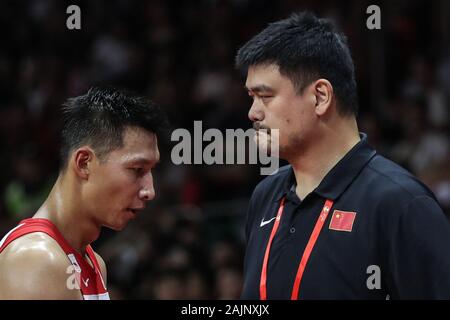 Beijing, China's Guangdong Province. 8th Sep, 2019. Yao Ming (R), chairman of the Chinese Basketball Association, and player Yi Jianlian of the Chinese men's basketball team react during the group M match between China and Nigeria at the 2019 FIBA World Cup in Guangzhou, south China's Guangdong Province, Sept. 8, 2019. Credit: Pan Yulong/Xinhua/Alamy Live News Stock Photo
