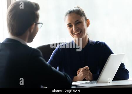 Smiling diverse businesspeople collaborating at briefing in office Stock Photo