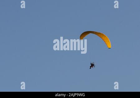 Paraglider using a motorised wing over Athens Greece Stock Photo