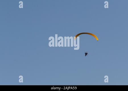Paraglider using a motorised wing over Athens Greece Stock Photo