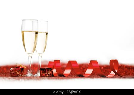 Two glasses of champagne with red decor, Valentines day concept Stock Photo