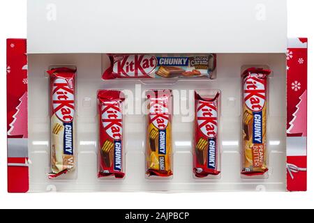 Box of Nestle KitKat selection chunky for Christmas  - different flavours - peanut butter, orange, white, salted caramel fudge flavour flavors flavor Stock Photo