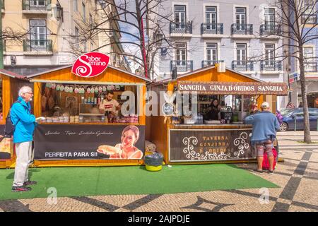 Lisbon, Portugal - March 29, 2018: People at the city center, stalls with sangria for Easter holidays Stock Photo
