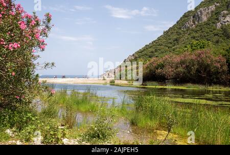 Ruins of the ancient city of Olympos in Cirali village in Antalya, Turkey Stock Photo