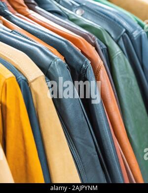 Multi-colored leather jackets, Fez, Morocco. Close-up. Vertical Stock Photo