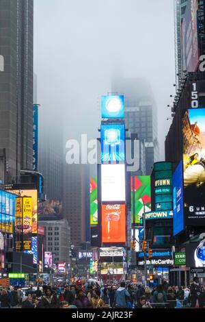 Visibility is obscured by dense fog in Times Square, NYC, USA Stock Photo