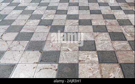 Wide checkered floor with black and white tiles Stock Photo