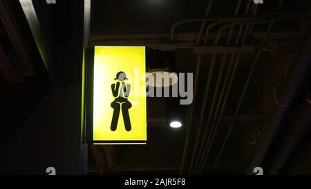 Lightbox restroom Signage hang on wall Stock Photo