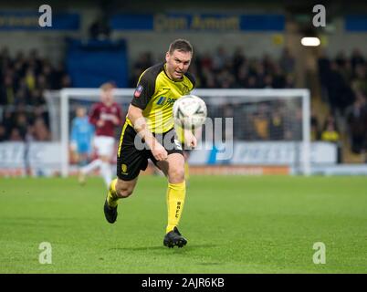 Burton Upon Trent, UK. 05th Jan, 2020.  Burton Albion versus Northampton Town; Jake Buxton of Burton Albion chasing down a loose ball - Strictly Editorial Use Only. No use with unauthorized audio, video, data, fixture lists, club/league logos or 'live' services. Online in-match use limited to 120 images, no video emulation. No use in betting, games or single club/league/player publications Credit: Action Plus Sports Images/Alamy Live News Stock Photo