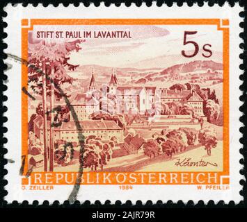 POLTAVA, UKRAINE - January 2, 2020.. Vintage stamp printed in Austria circa 1984 show Saint Paul's Abbey in Lavanttal Stock Photo